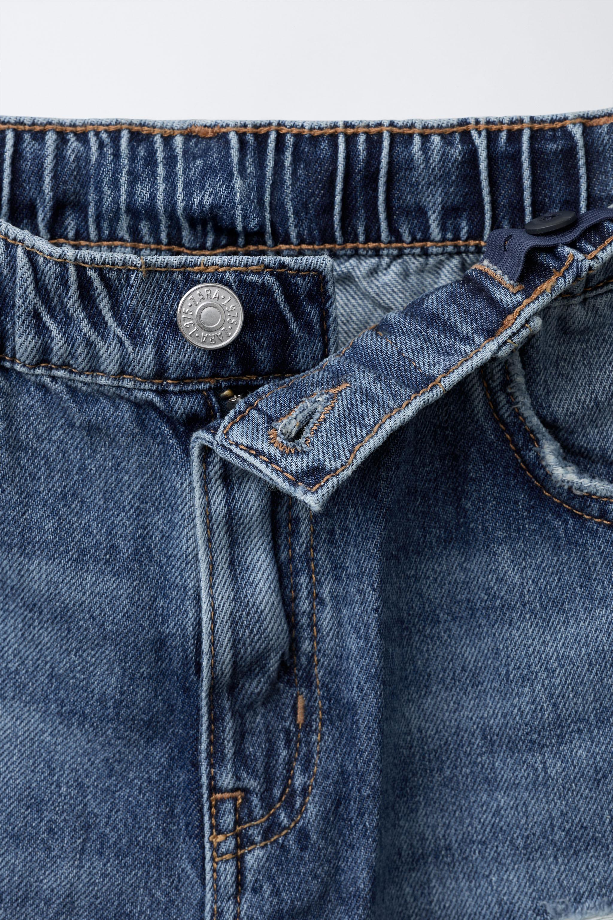 RIPPED RELAXED JEANS